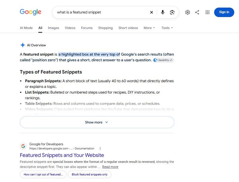 2026年10月谷歌英文搜索what is a featured snippet,顶上是AI概览,谷歌官方文档在第一条自然结果